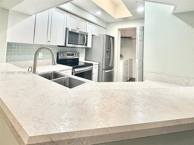 Photo - 3020 Alcazar Pl Unit 208