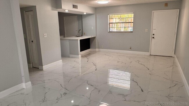 Building Photo - 9150 NW 38th Dr Unit 106