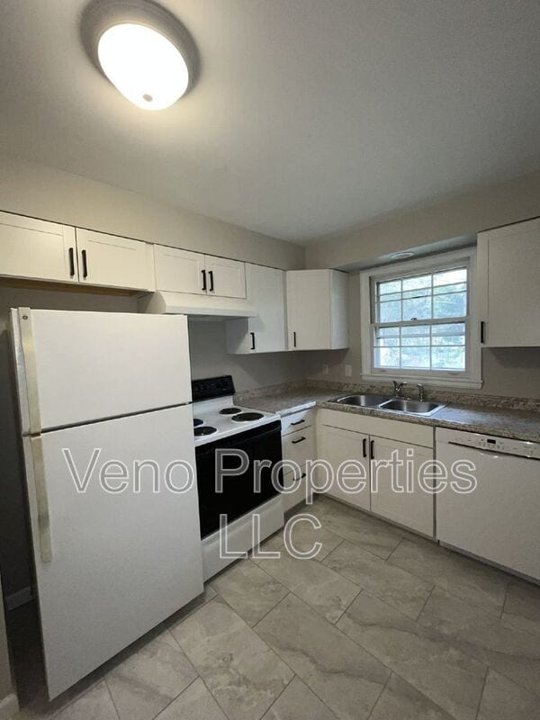 Photo - 9/11/13 Village Dr.