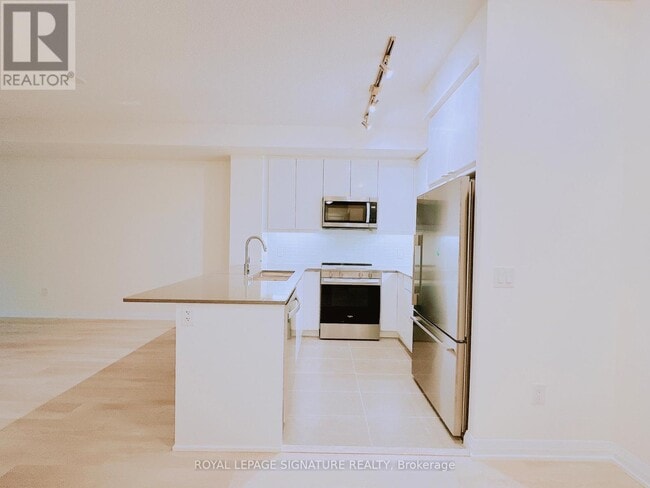 Photo - 3260 Sheppard Ave E Unit 311