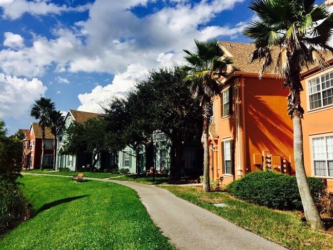 Building Photo - 9020 Lake Chase Island Way Unit 9020