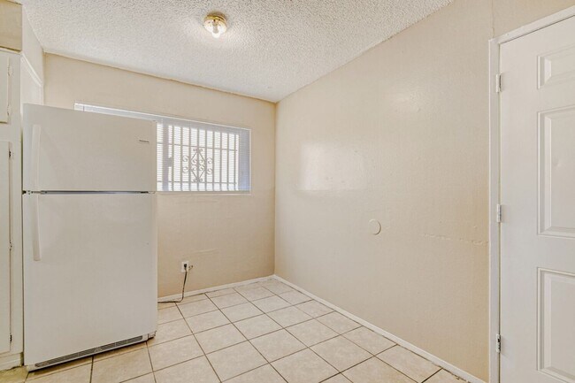 Photo - Spacious 2-Bed, 1-Bath with Open Concept & Natural Light