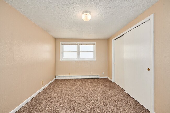 Photo - Coming Soon: 2 BR unit that includes water, trash, and yard care. Unit C