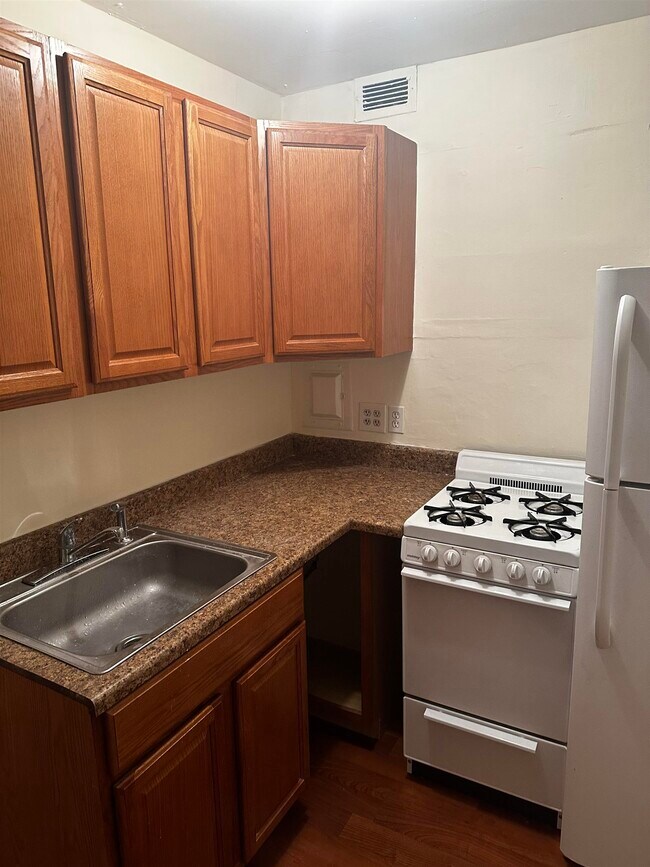 Building Photo - 6515 JFK Blvd E Unit 4L