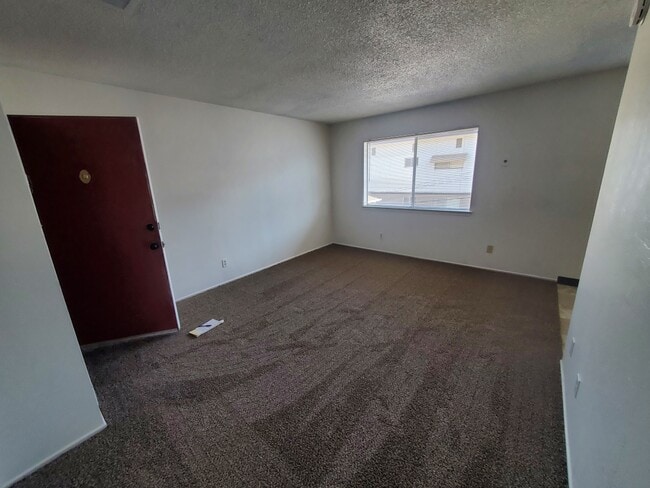 Sala de estar - The Cove Apartments