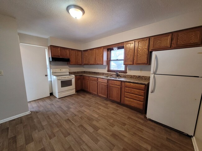 Building Photo - Four Bedroom Single-Family Home