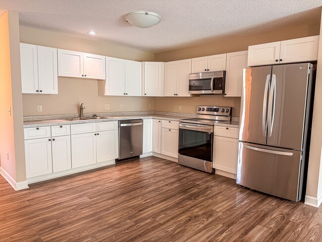 Building Photo - ALL NEW INTERIOR - 2 Bedroom Town Home