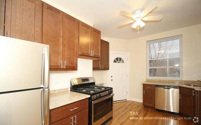 Building Photo - 1607 W Berteau Ave Unit 1 Rental