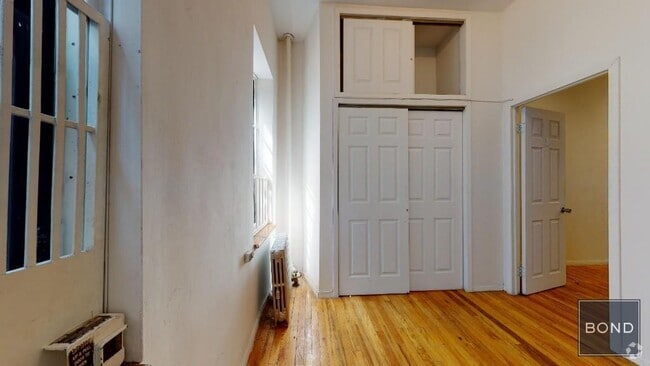 Building Photo - 214 E 10th St Unit 1 Rental