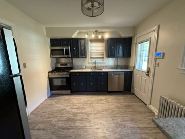 Photo - Discover comfort and convenience in charming North Michigan Park!