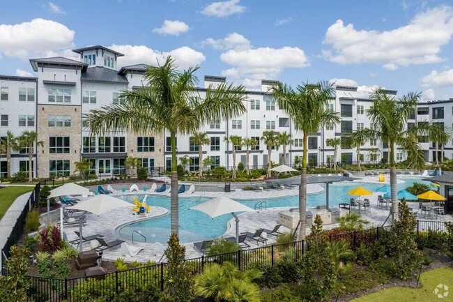 Relaxing Pool with Cabana, Wi-Fi, Sun Shelves & Grill Areas - The Parian Luxury Apartments