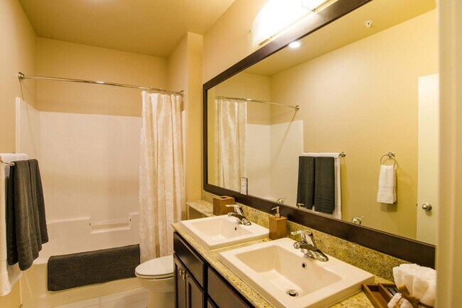 Siena Bathroom with Dual Sinks - Siena Apartment Homes