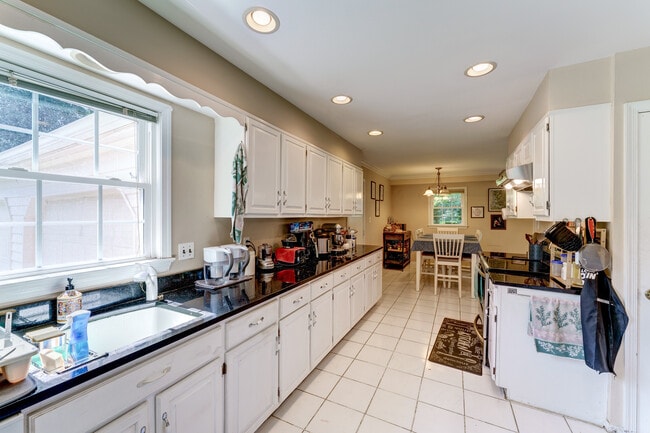 White wood cabinetry abounds! - 10108 Donegal Ct