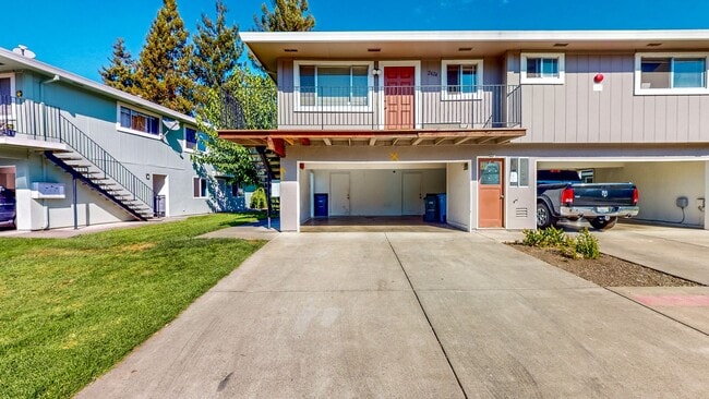 Photo - 2 story 2 bedroom 1 bath condo with covered parking, private storage and community pool!