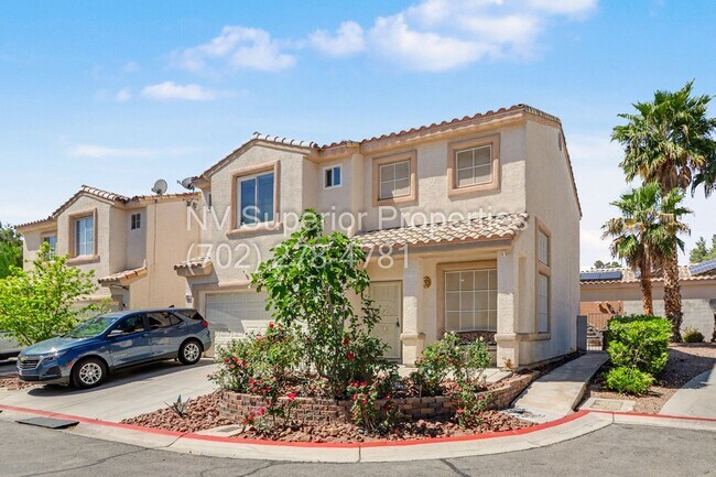 Photo - NW!! 4 Bedrooms!!! All Tile and Pergo flooring T/O!! NO Carpet!!! Low Maintenance Desert landscap...