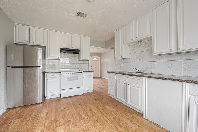 Photo - Very affordable spacious 4bed/2bath single-family house!