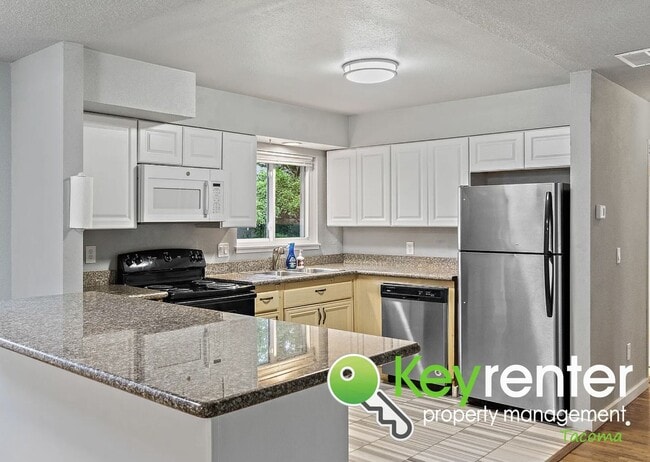 Photo - Updated 4-Bedroom, 2-Bath Tacoma Home for Rent Near Tacoma Community College and 6th Ave!