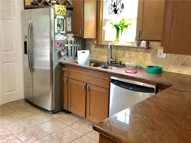 Photo - Great 4X2 Stand Alone Home for August! Unit #A