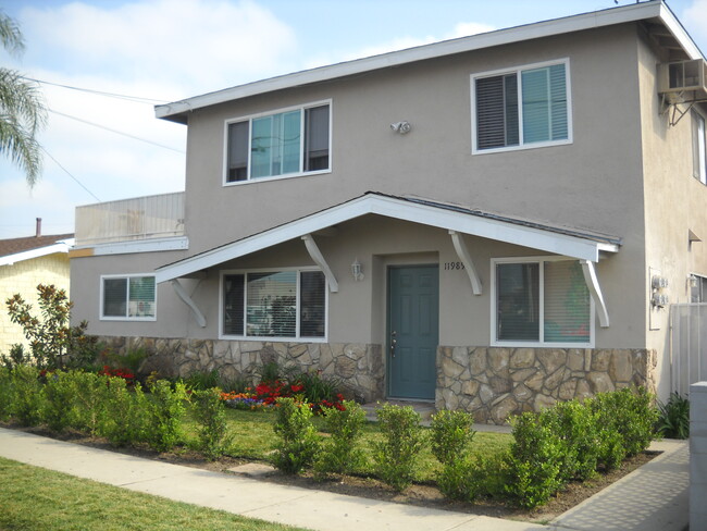 Street view (unit is upstairs of back building) - 11989 Sycamore St Apartments Unit B