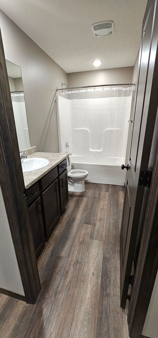 Photo - 2-bedroom, 1 bathroom apartment with 2 car attached garage Unit Apartment A