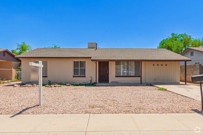 Building Photo - Cute 4 bedroom 2 bath Centrally Located Rental