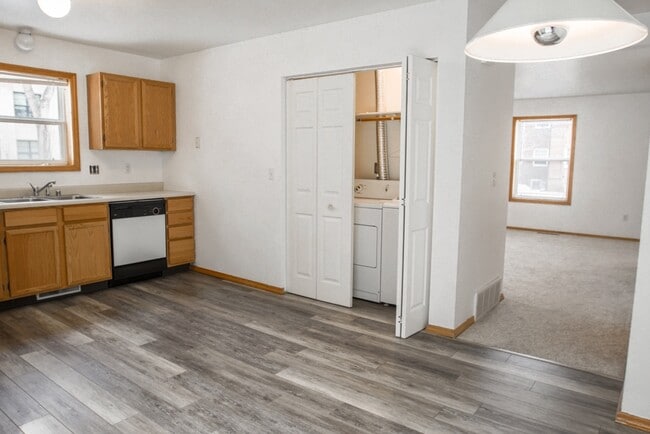Kitchen with in unit washer and dryer