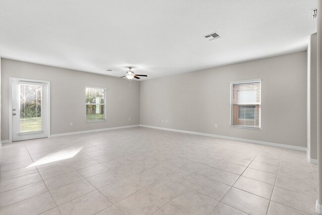 Photo - "Spacious 5-Bedroom Retreat in Apollo Beach - Modern Living with 2.5 Baths on White Chicory Dr!"