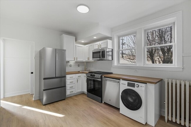 Building Photo - 5505 W Melrose St Unit 1