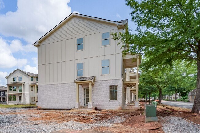 Photo - Leasing for August 2026 | $1,600 per Bedroom 5BR / 5.5BA New Construction Townhome just a few blo...