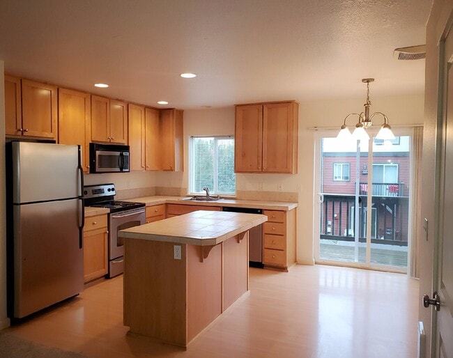 Photo - 3-Level Townhouse with Open Layout and Garage