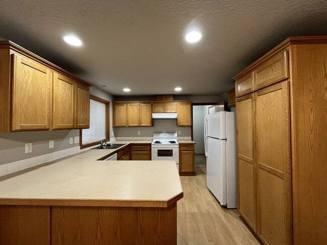 Photo - 3-Bed Home with Fireplace, Fenced Backyard, 2 Car Garage & Front Patio!