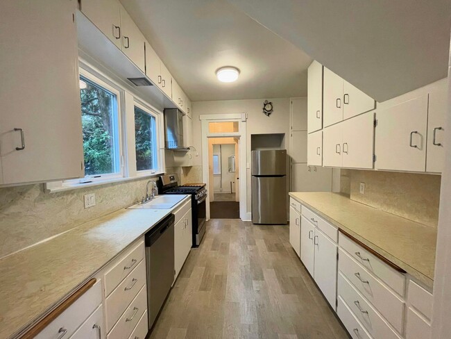 Photo - Elegant 4BR 2.5Bath Home with Fenced Yard & Garage Across from Seattle Prep**2 weeks free**