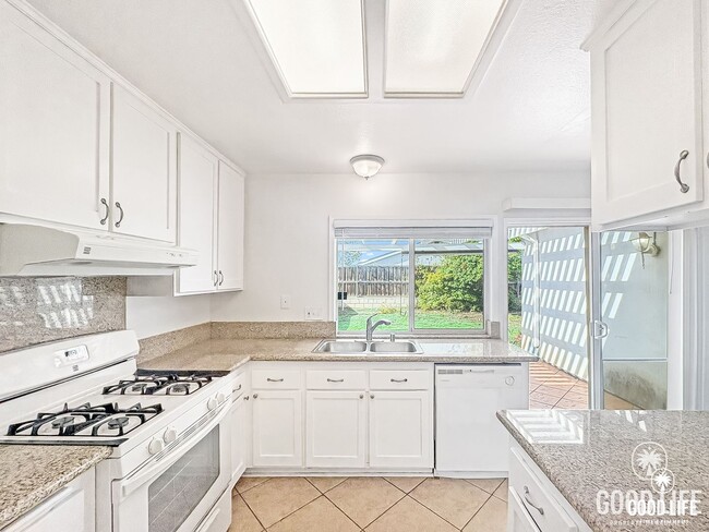 Photo - Nice 4B/2BA w/ Attached Garage & Fenced Yard