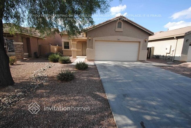 Building Photo - 8862 W Hilton Ave Rental