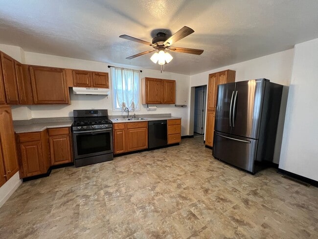 Photo - Conveniently Located 4 Bed/2 Bath Home-Central AC and Heat-Available 3/01!