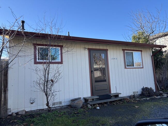 Back entrance with off street parking - 1043 E Main St