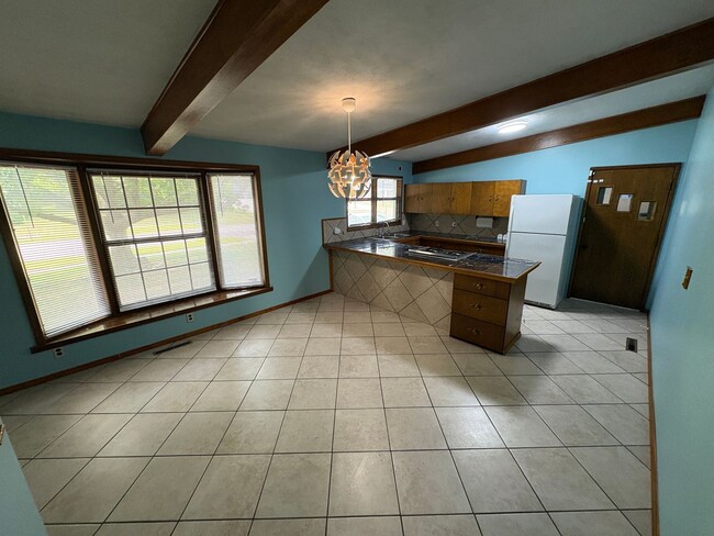Photo - Spacious Home with Attached Garage & Fenced Backyard