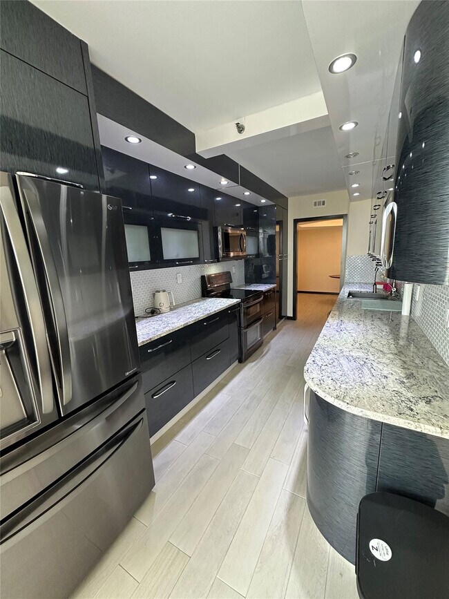 Photo - 19707 Turnberry Way Unit 8L