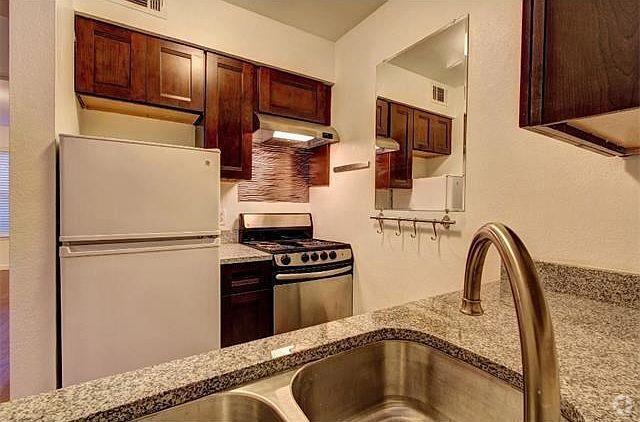 Building Photo - 3400 Speedway Unit 303 Rental