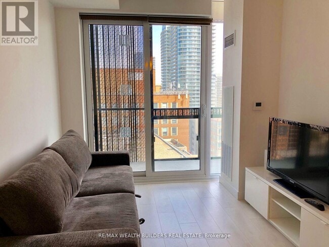 Photo - 8 Eglinton Ave E Unit 1010
