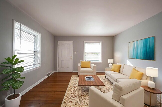 Building Photo - "Charming 1-Bedroom Duplex with Hardwood F...