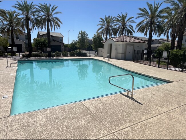 Photo - 3-Bed Home with Community Pool Access, Low-Maintenance Yard, and Upgraded Kitchen, Featuring Gran...