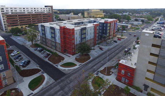 Pictured: Building 3. Academy has three separate apartment buildings, a row of town home and parking garage.