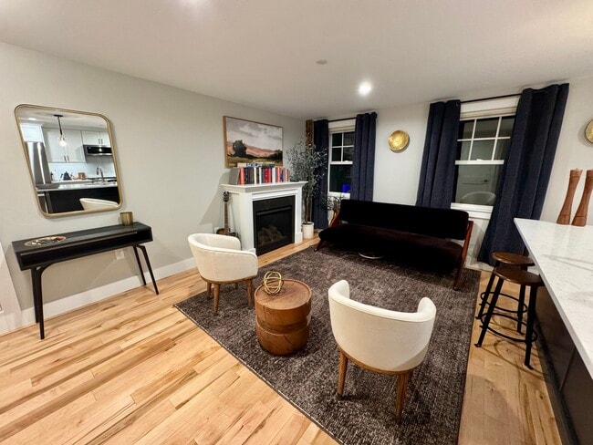 Living room with fireplace - 45 Market St Unit .3