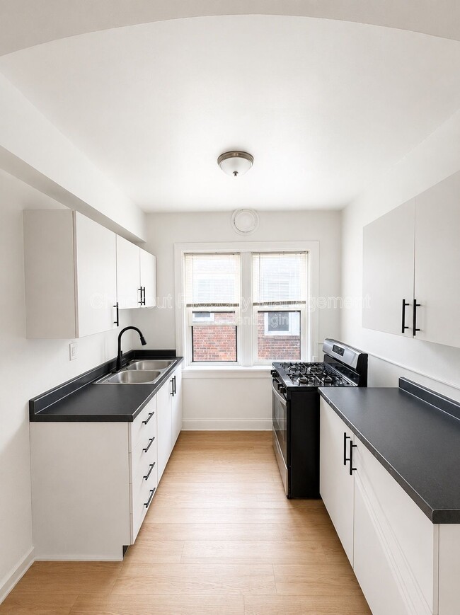 Building Photo - 7340 Forsyth Blvd Unit 307