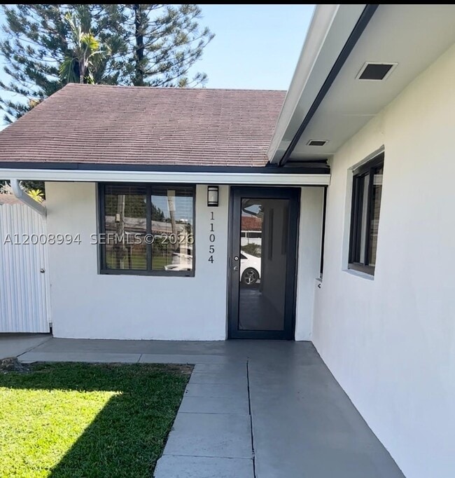 Building Photo - 11050 SW 5th St Unit 11056