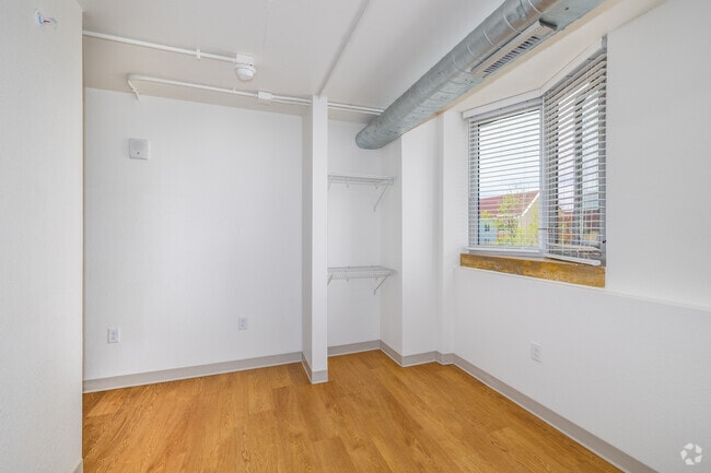 3BR, 2BA - 1,061SF - Primary Bedroom - Mosaic Community Campus