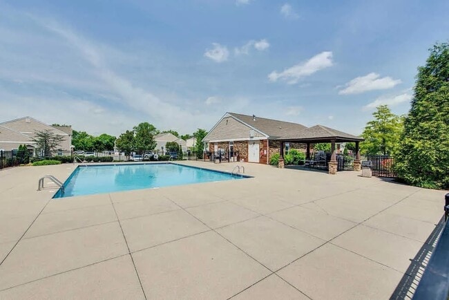 Enjoy several community amenities such as a pool. - 3010 Bellflower Cir
