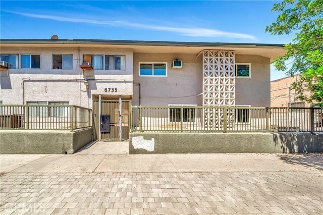 Building Photo - 6735 Elmer Ave Unit 4