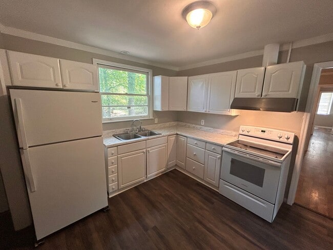 Photo - 4br 1.5 Bath brick home with garage.